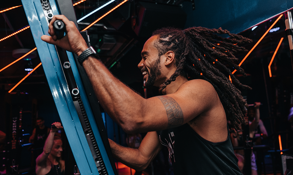 Working the Versaclimber at Sweat By BXR