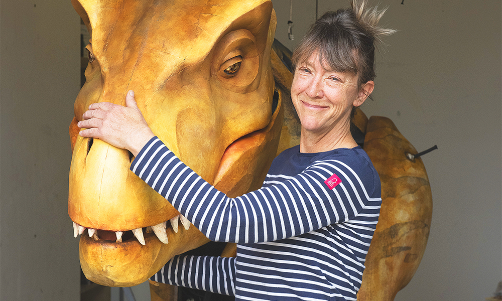 Charlie Tymms with her T-Rex puppet