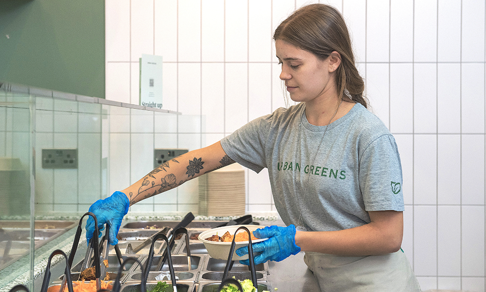 Serving up salad at Urban Greens