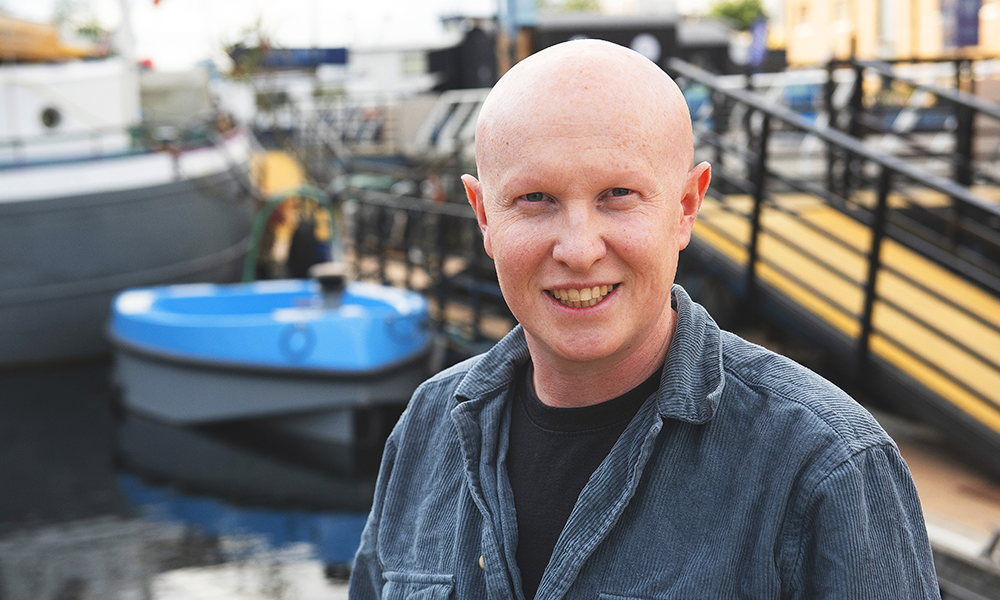 Tommo of Skuna Boats with hybrid River in the background