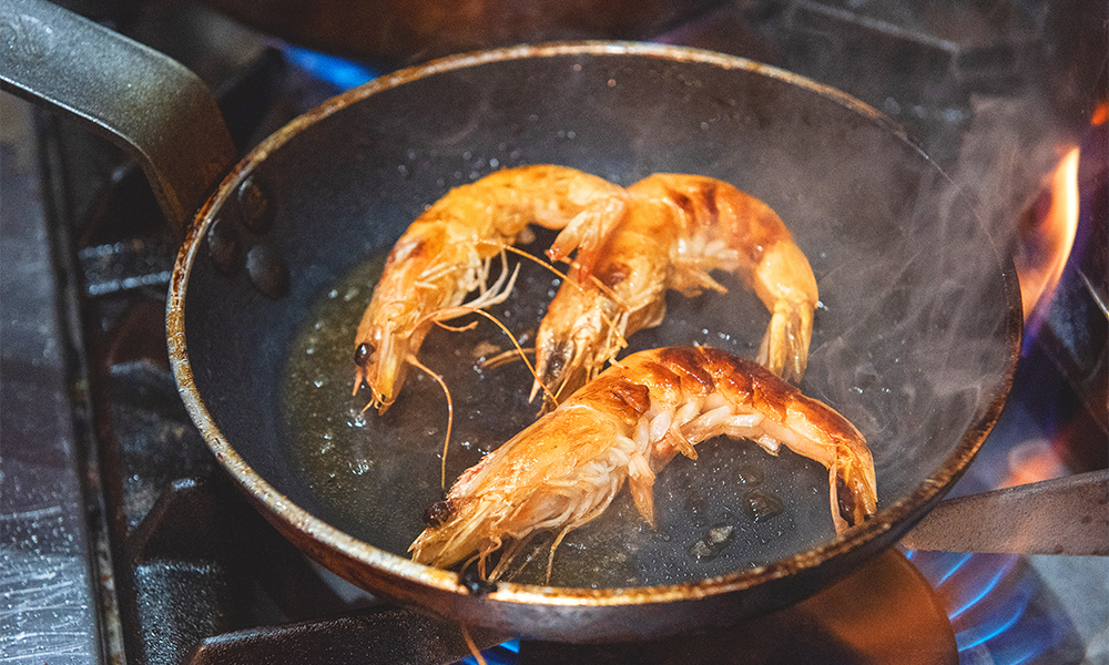 Prawns cooking ready to join mussels and orzo