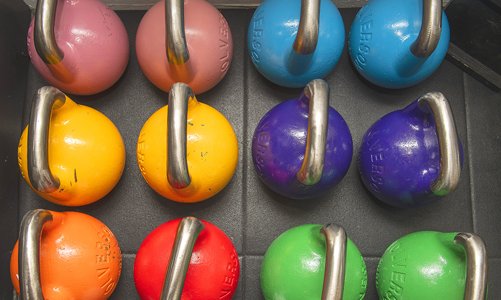 Brightly-coloured kettlebells at the ready 