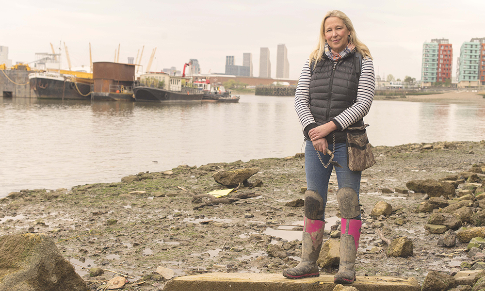 Artist Nicola White on the Thames foreshore 