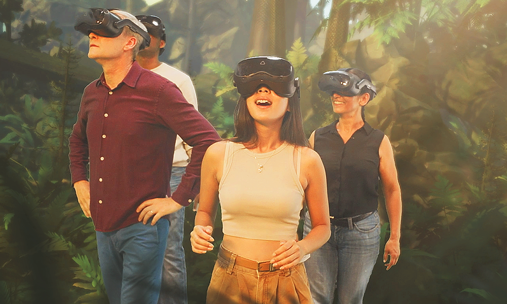 An image of four people wearing black virtual reality visors to explore Eclipso Life Chronicles