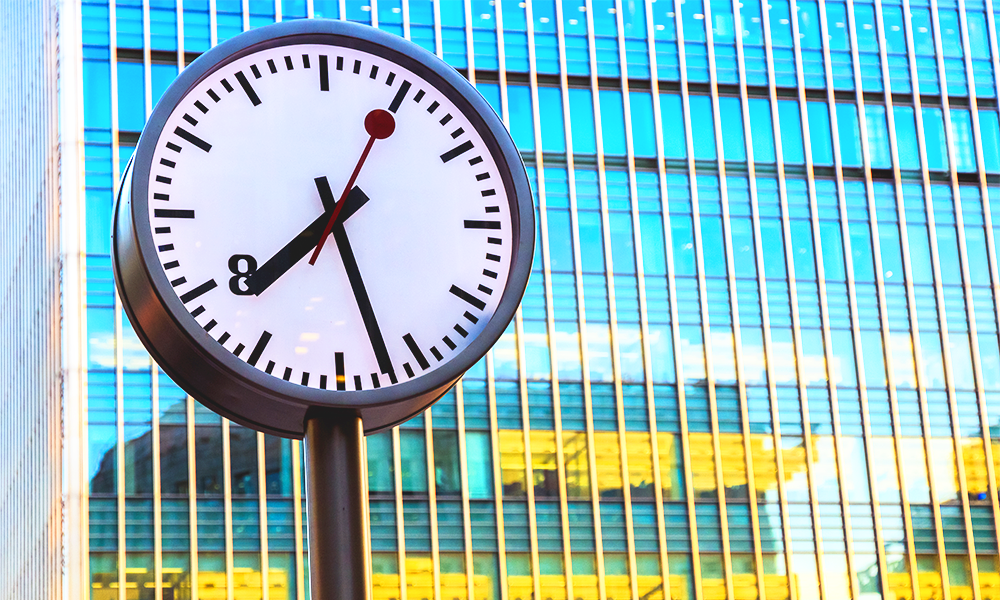 Image shows a clock face in Canary Wharf, one of the areas covered by Wharf Life, a Tower Hamlets Local Newspaper