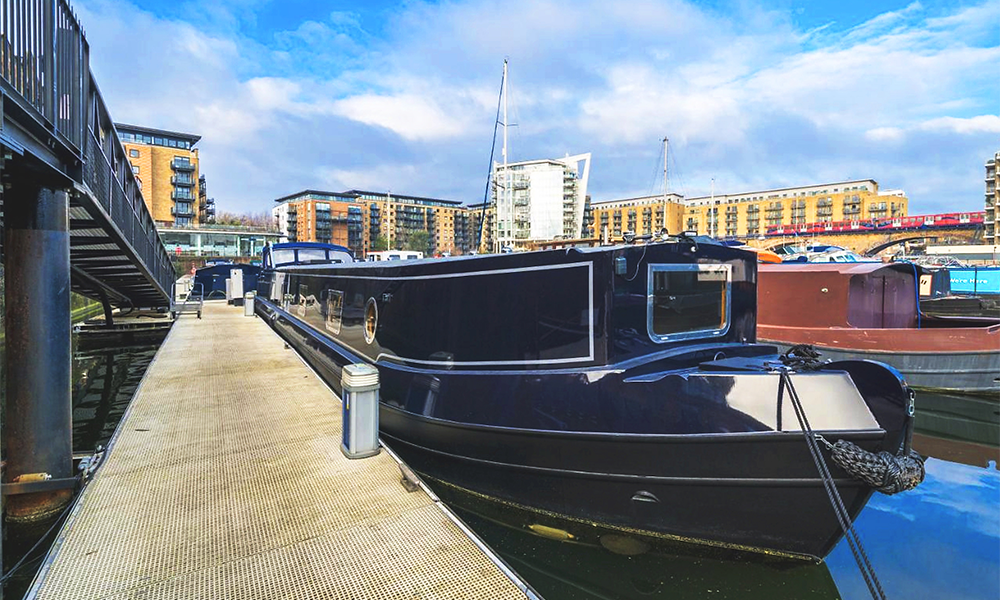 A Greenwich house boat moored at Limehouse Marina, available through Boar Sales by Aquavista