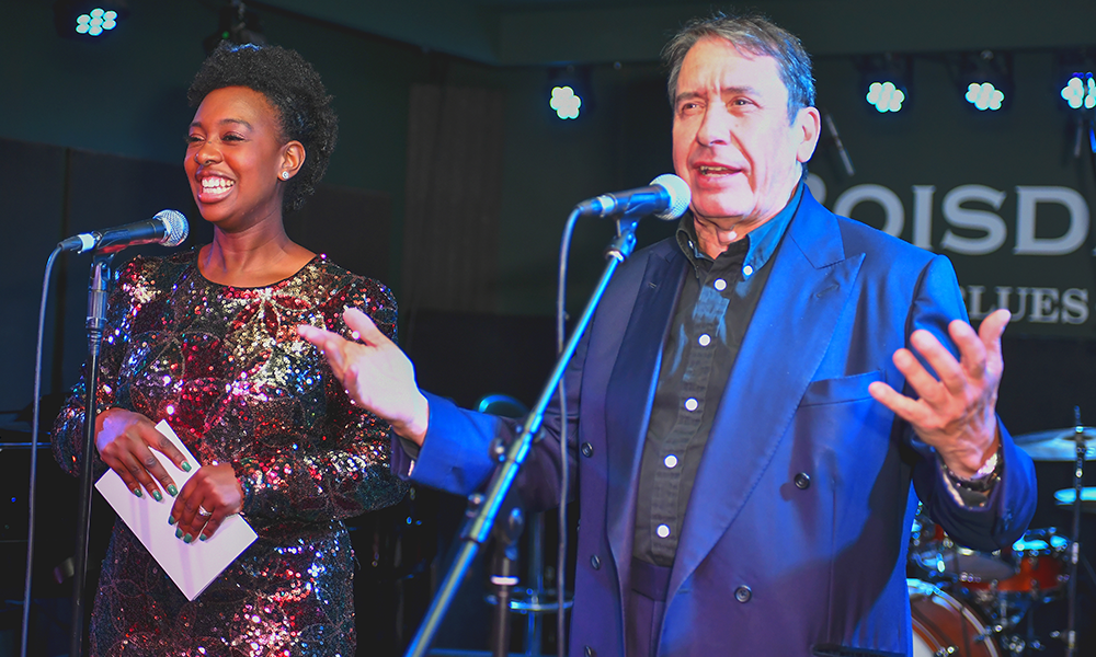 Image shows Jools Holland and YolanDa Brown hosting the Boisdale Music Awards