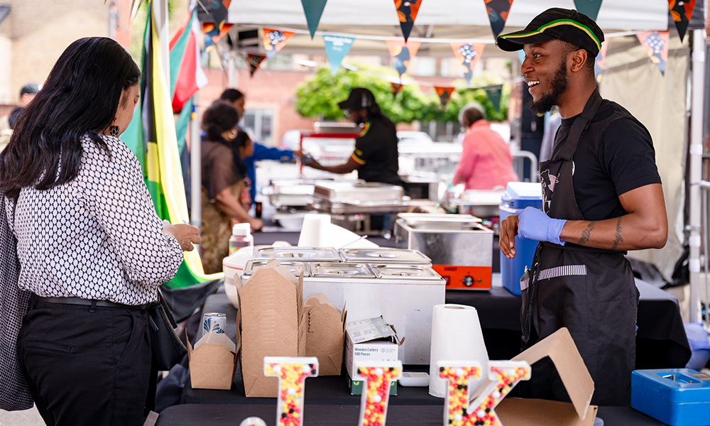 Image shows traders at a Black Pound Market