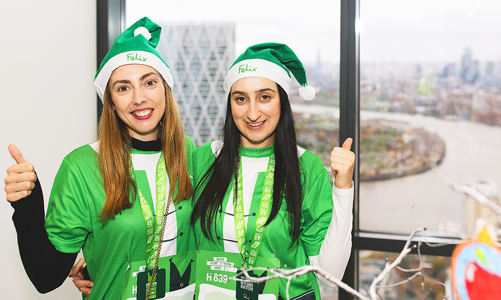 Participants in the Santa Stair Climb get a hat and T-shirt as a memento of their challeng