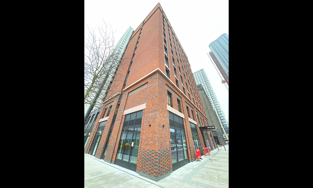 The red brick edifice of 3 West Lane, one of two Vertus Edit buildings at Wood Wharf