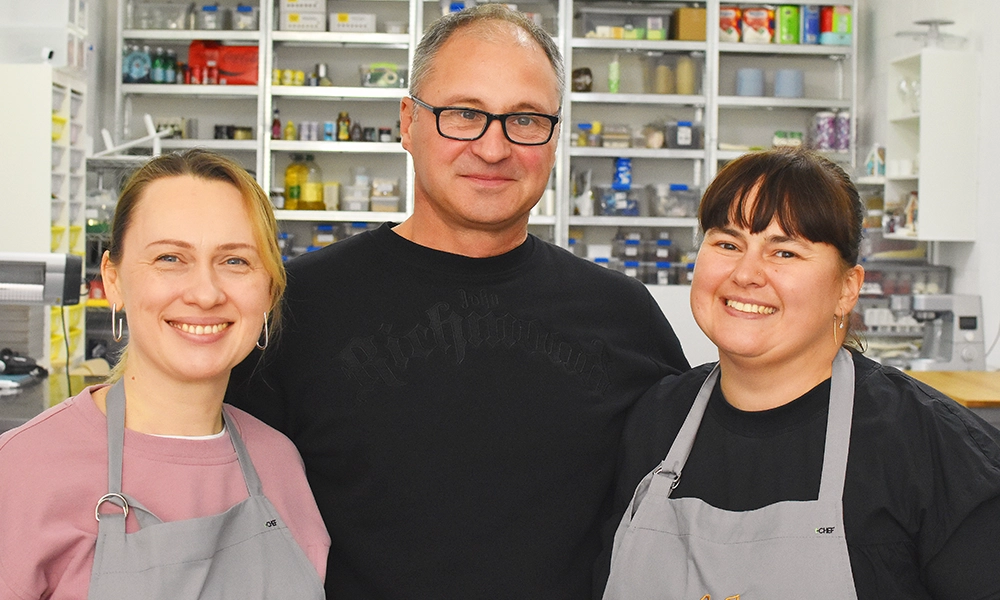 From left, Payava’s Olesia Lutsenko, Pavlo Kovalenko and Valentyna Vierovkina at the Royal Docks bakery - image Jon Massey