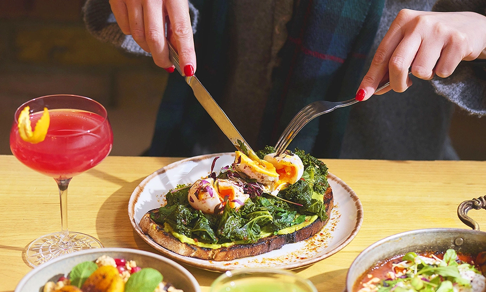 
Harissa eggs with kale and smashed avocado on sourdough toast - image by Brother Marcus