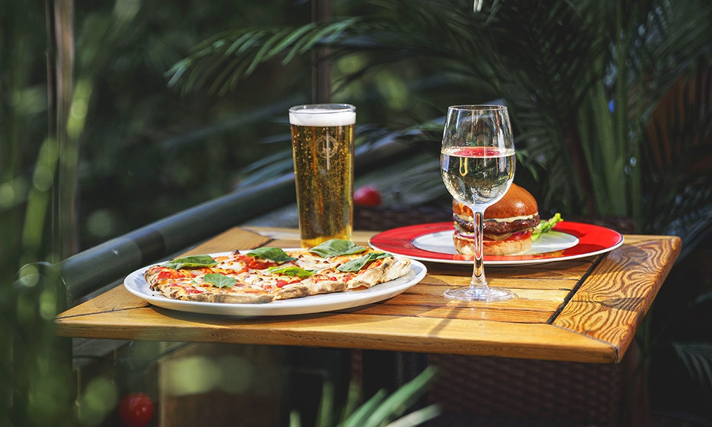 This image has an empty alt attribute; its file name is Boisdale_530_5456WEB.webp
In celebration of its 15th birthday, Boisdale Of Canary Wharf is offering diners 2010 prices, £8 each for its Scottish pizza and its standard burger - image by Boisdale