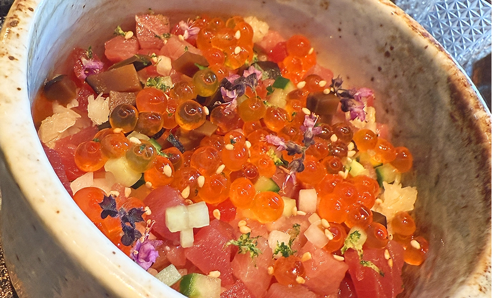 
Three types of tuna plus salmon roe waiting to be made into sushi by diners - image by Jon Massey