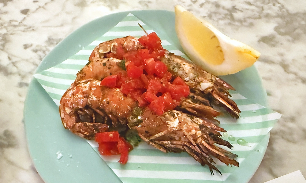 Grilled prawns with tomatoes and garlic at Lina Stores - image by Jon Massey