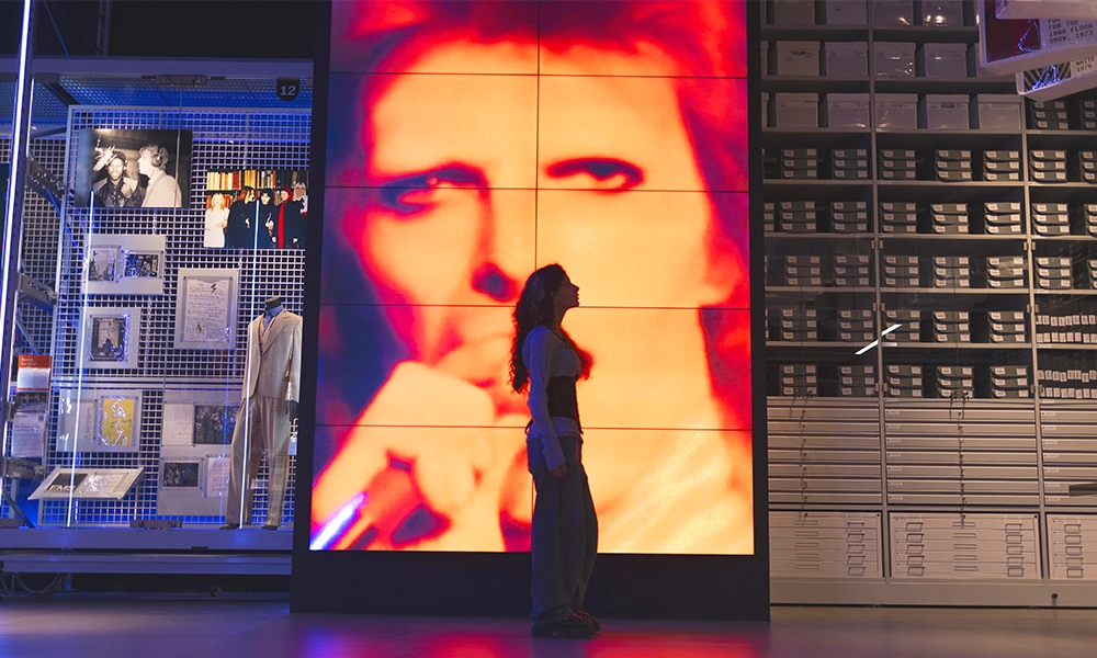 A visitor considers exhibits on show at the new centre - image by David Parry / PA Media Assignments