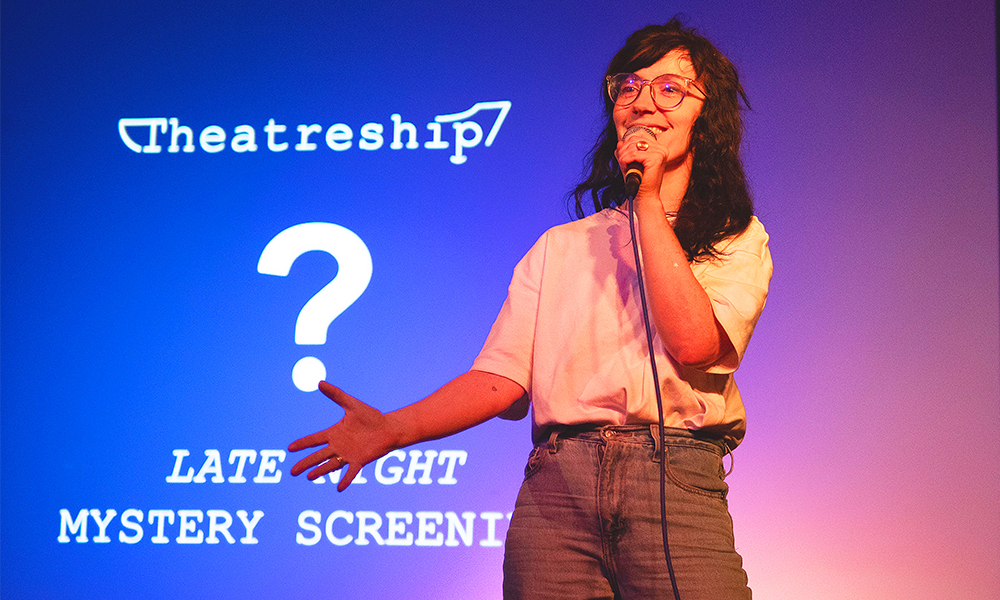 Natalie introduces a mystery screening at the venue - image by Adrian Sidor
