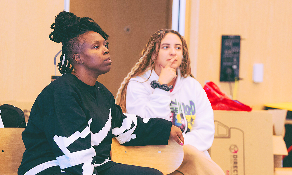 Danielle watches performers in rehearsal - image by Helen Murray