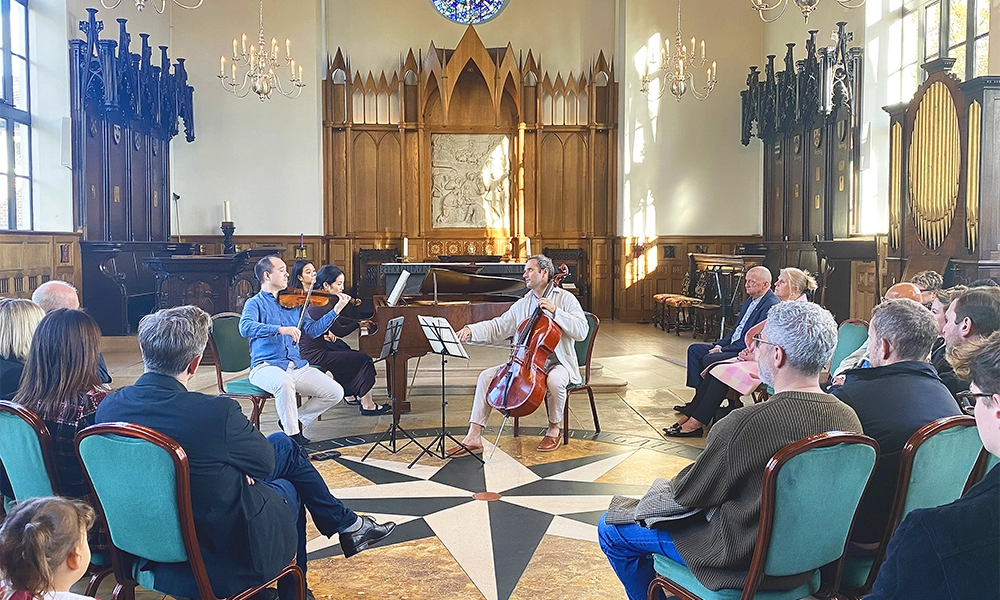 Tom is joined by pianist Jennifer Lee and violinist Tim Yap to perform the first recital at Brahms Club - image by the Royal Foundation Of St Katharine