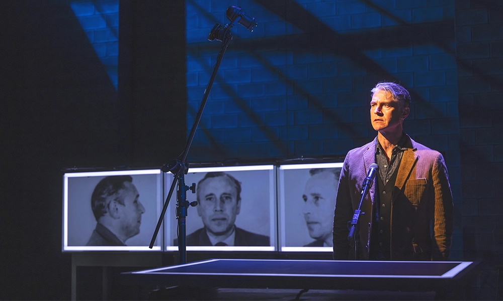 The play focuses on those seeking to uncover the stories behind the images and the album - The show features projections of images from the album - image supplied by Here There Are Blueberries / Tectonic Theater
