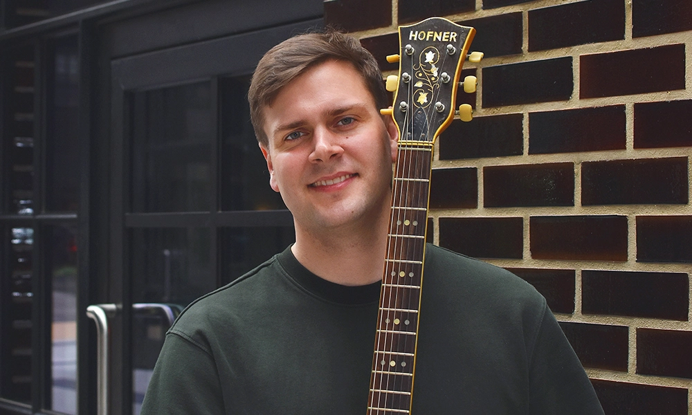 Kitchen Jam co-founder Darryl Powis says playing with others is a great way to develop new skills on the guitar - image by Jon Massey / Wharf Life