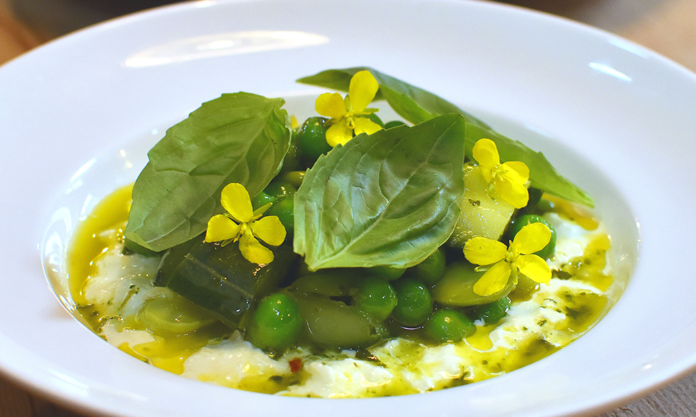 Stracciatella (the creamy bit in a burrata) served with a lush garnish of peas, broad beans, cucumber, thai basil and broccoli flowers (£11.50) - image by Jon Massey / Wharf Life