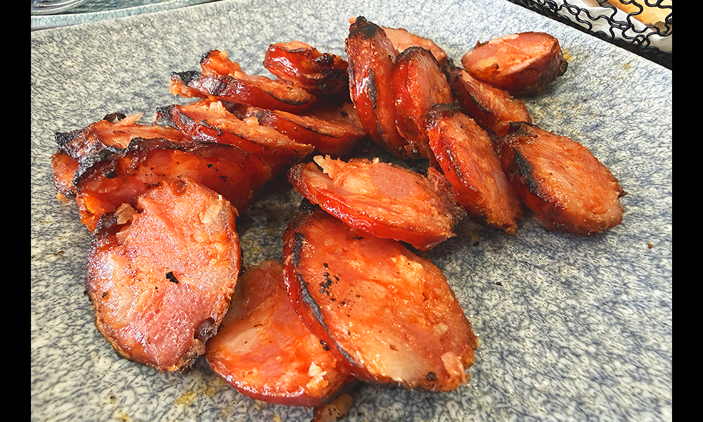 Flamed chorizo at Estrela - image by Jon Massey / Wharf Life