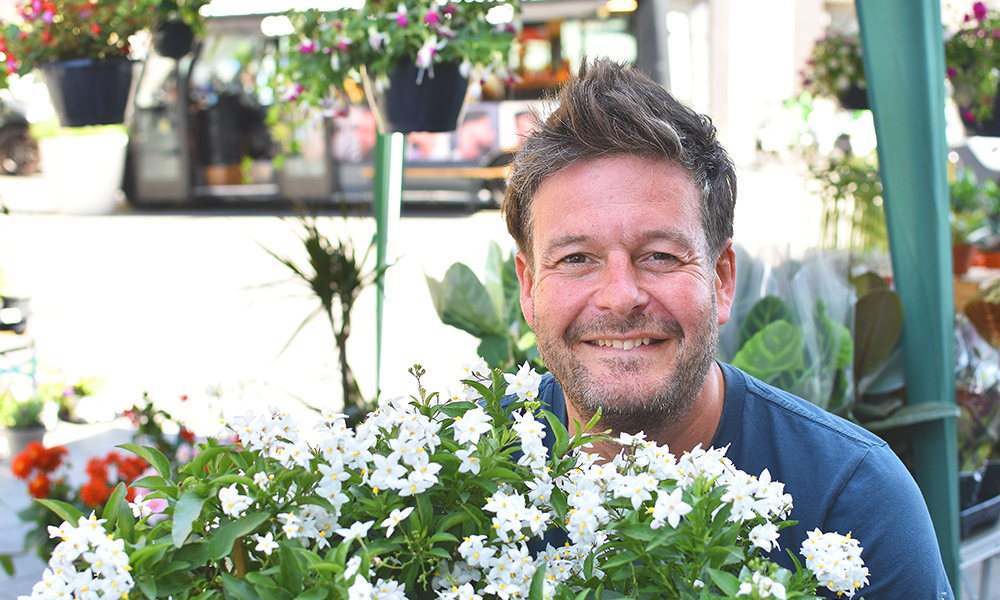 Plant And Person founder Will Daltrey at his Canada Water stall in Deal Porter Square - image by Jon Massey / Wharf Life