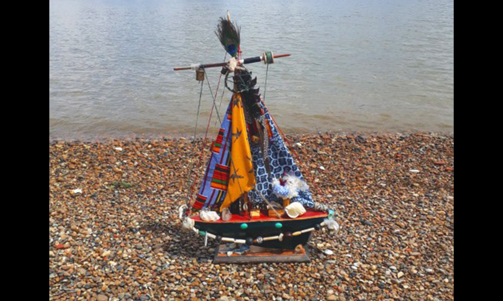 Remiiya's model boat, the Timehri on a beach on the Isle Of Dogs - image by Remiiya Badru
