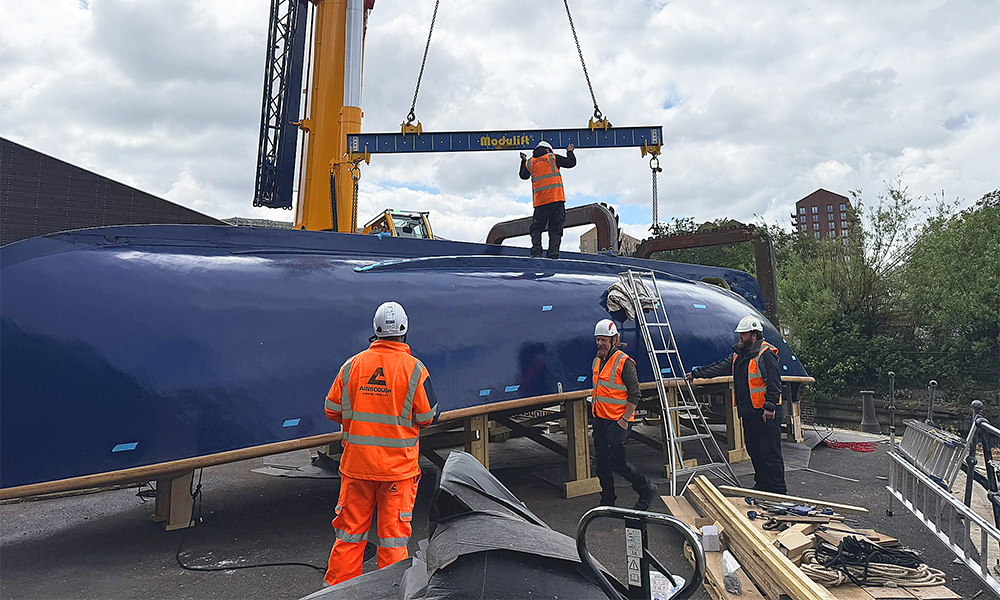 The boat is prepared for craning into place - image by Nicholas Alexander
